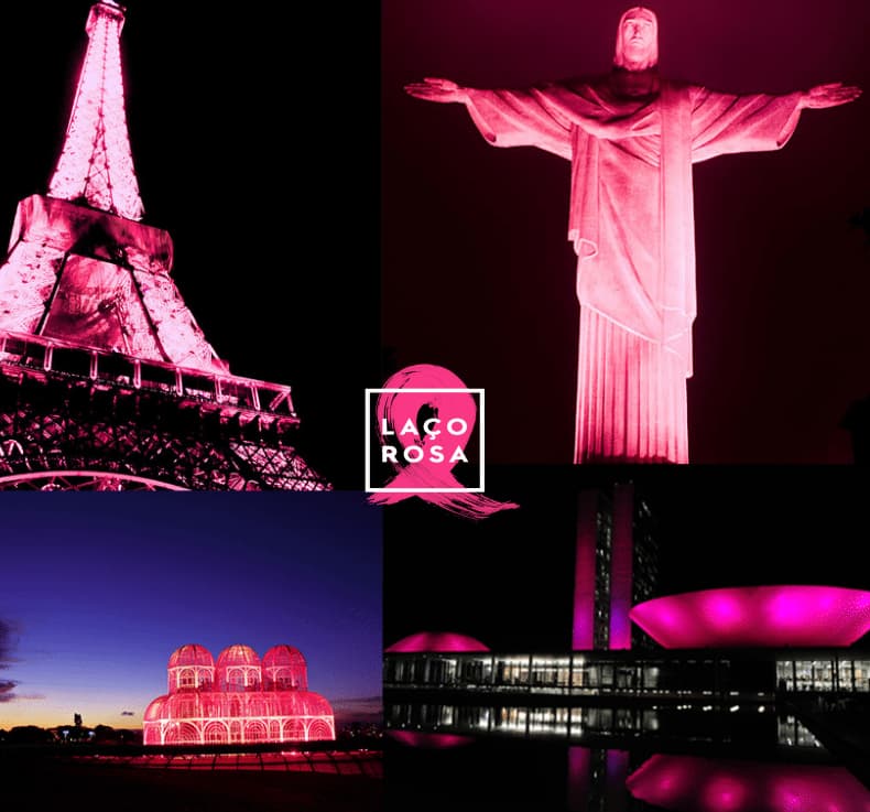 Imagem de monumentos iluminados com a cor rosa para post sobre Outubro Rosa Soma Urbanismo