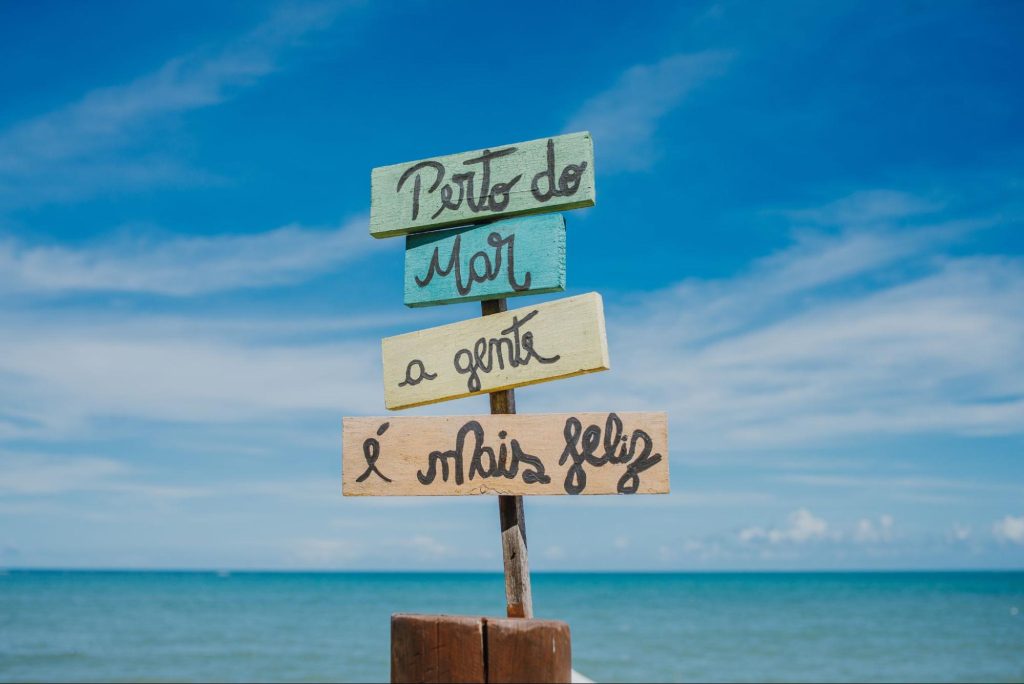 Imagem de praia em Porto Seguro, na Bahia. Imagem ilustrativa sobre a história da cidade, do blog da Soma Urbanismo.